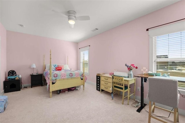 bedroom featuring carpet floors, visible vents, ceiling fan, and baseboards