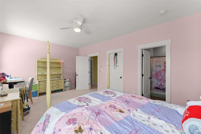 carpeted bedroom with a ceiling fan