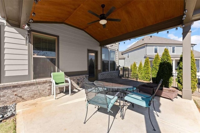 view of patio / terrace with a ceiling fan and outdoor dining area