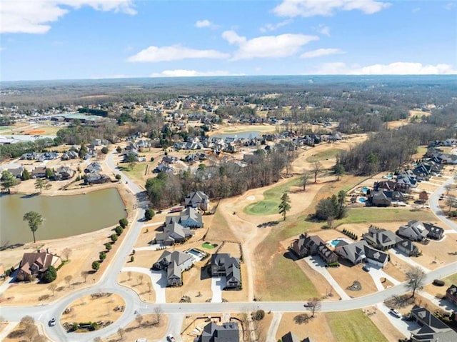 aerial view featuring a water view and a residential view