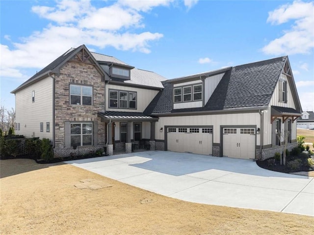 view of front of property with concrete driveway, board and batten siding, a standing seam roof, metal roof, and stone siding