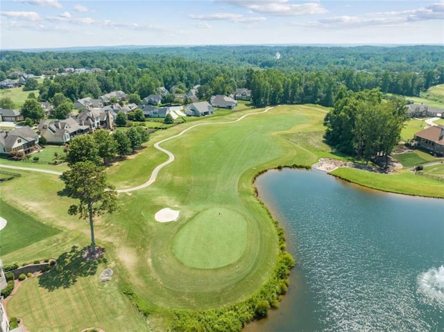 aerial view featuring view of golf course and a water view