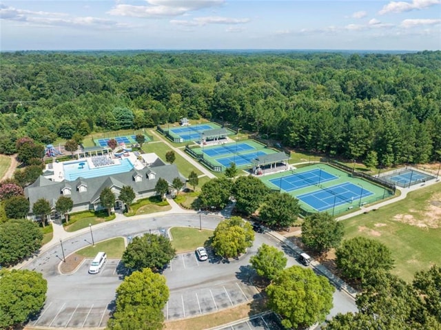 aerial view featuring a wooded view