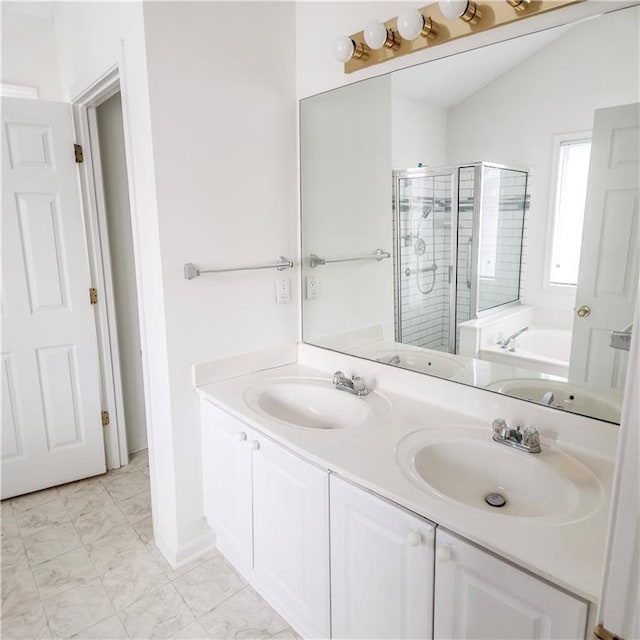 bathroom with vanity, lofted ceiling, and shower with separate bathtub