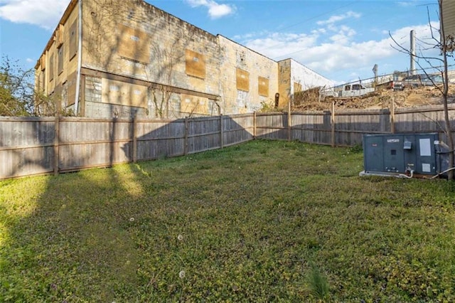 view of yard with a fenced backyard