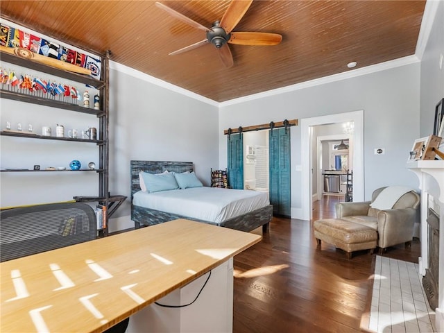 bedroom featuring dark hardwood / wood-style flooring, a barn door, wooden ceiling, and ceiling fan