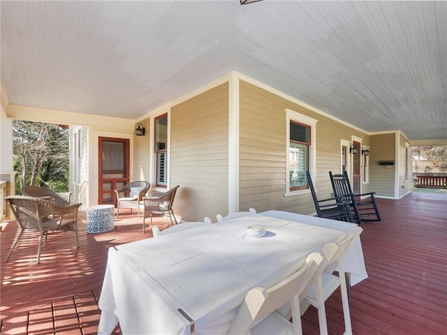 wooden deck featuring covered porch