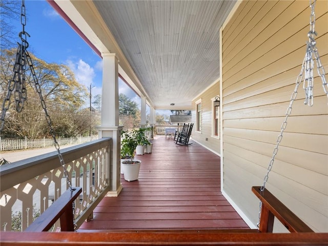 deck with covered porch