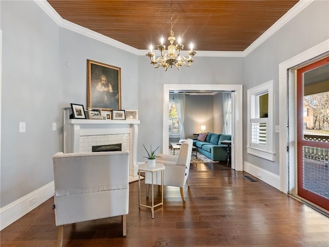 sitting room with dark wood-type flooring, plenty of natural light, and wooden ceiling