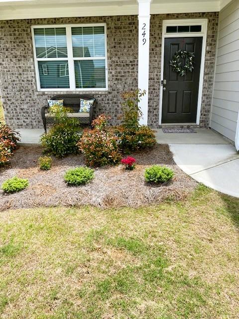 249 Creekview Way, Dallas, GA 30132 - entrance to property featuring a porch and a yard