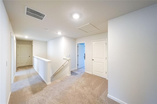 249 Creekview Way, Dallas, GA 30132 - hall featuring an upstairs landing, light colored carpet, recessed lighting, baseboards, and attic access