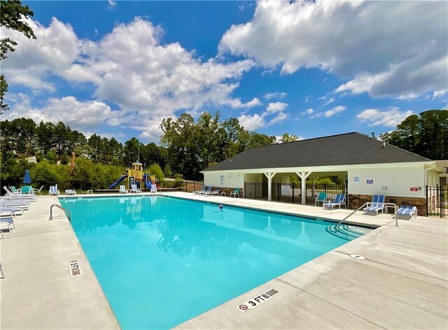 249 Creekview Way, Dallas, GA 30132 - community pool with fence and a patio area