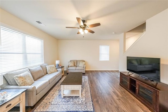 249 Creekview Way, Dallas, GA 30132 - living area with a ceiling fan, wood finished floors, and baseboards