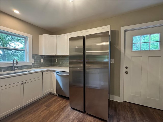 8245 Pleasant Grove Cir, Gainesville, GA 30506 - kitchen featuring stainless steel appliances, a sink, white cabinets, dark wood finished floors, and recessed lighting