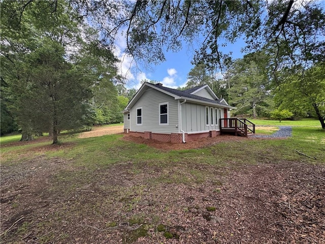 8245 Pleasant Grove Cir, Gainesville, GA 30506 - view of home's exterior featuring a lawn