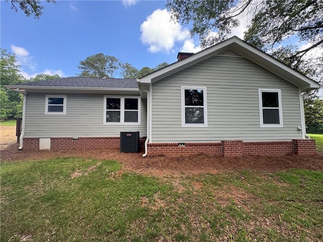 8245 Pleasant Grove Cir, Gainesville, GA 30506 - rear view of property with central AC, crawl space, and a lawn
