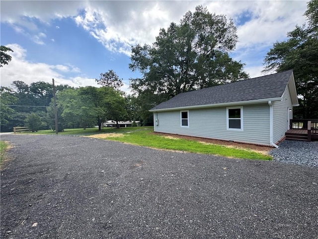 8245 Pleasant Grove Cir, Gainesville, GA 30506 - view of side of property featuring a deck and roof with shingles