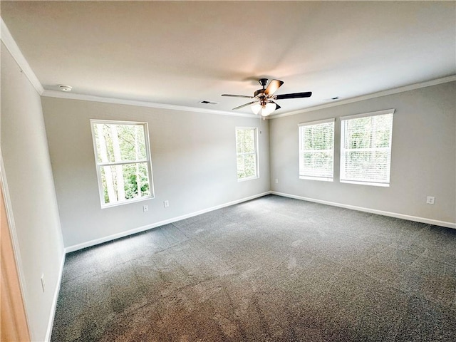 spare room featuring ornamental molding, carpet flooring, visible vents, and baseboards