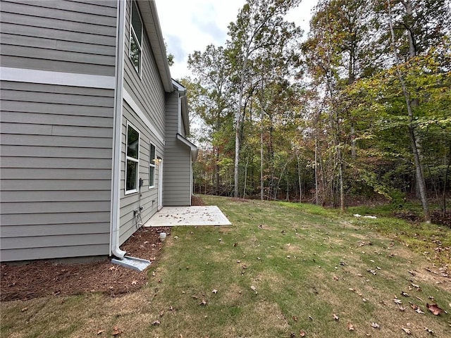 view of yard with a patio area