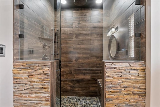 bathroom featuring a shower stall