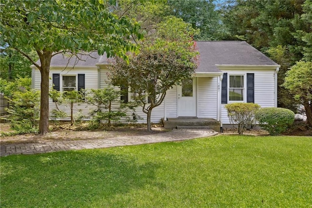 1891 8th St, Atlanta, GA 30341 - view of front of home featuring a front yard and a shingled roof