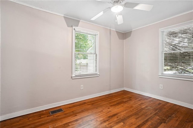 1891 8th St, Atlanta, GA 30341 - spare room featuring crown molding, wood finished floors, baseboards, and a ceiling fan
