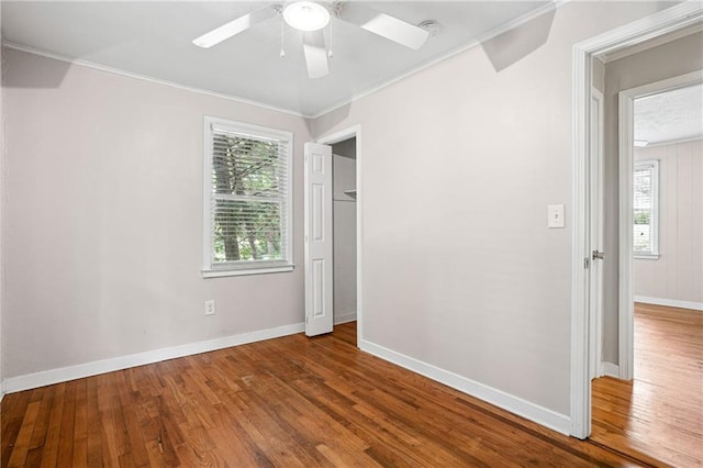 1891 8th St, Atlanta, GA 30341 - unfurnished room featuring wood finished floors, crown molding, baseboards, and a ceiling fan