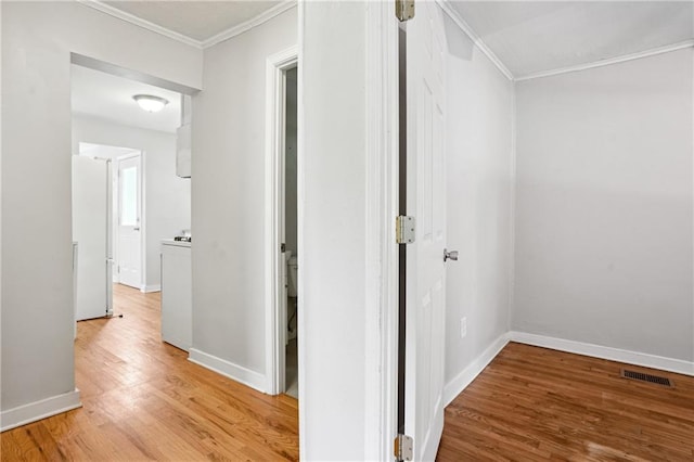 1891 8th St, Atlanta, GA 30341 - hallway featuring light wood-type flooring, ornamental molding, and baseboards