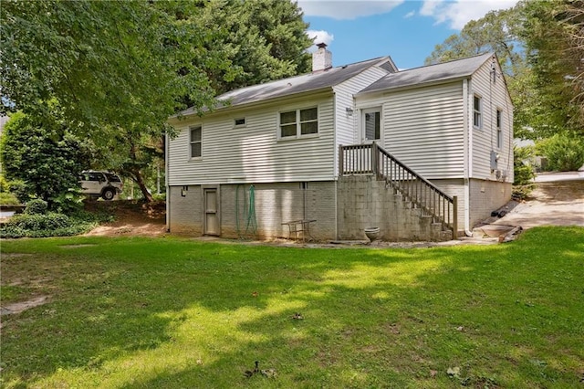 1891 8th St, Atlanta, GA 30341 - back of house featuring a yard, stairway, and a chimney