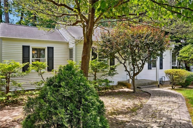 1891 8th St, Atlanta, GA 30341 - view of property exterior with a shingled roof