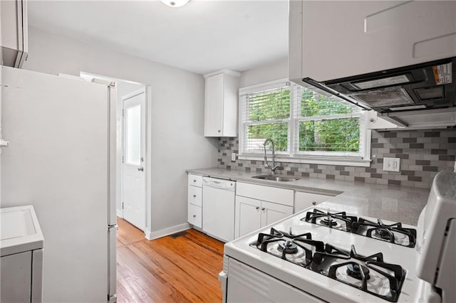 1891 8th St, Atlanta, GA 30341 - kitchen featuring white appliances, a sink, range hood, decorative backsplash, and white cabinets