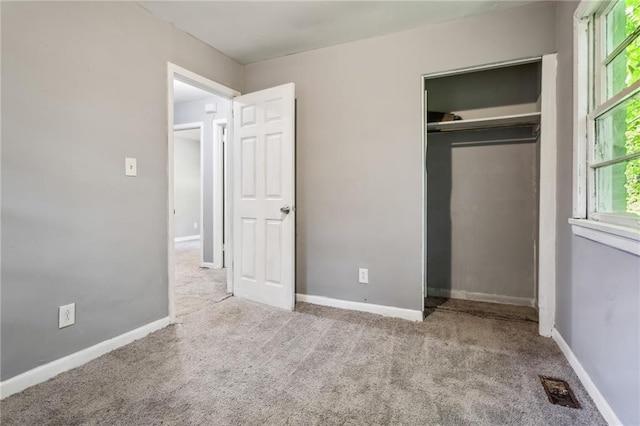 spare room with carpet flooring