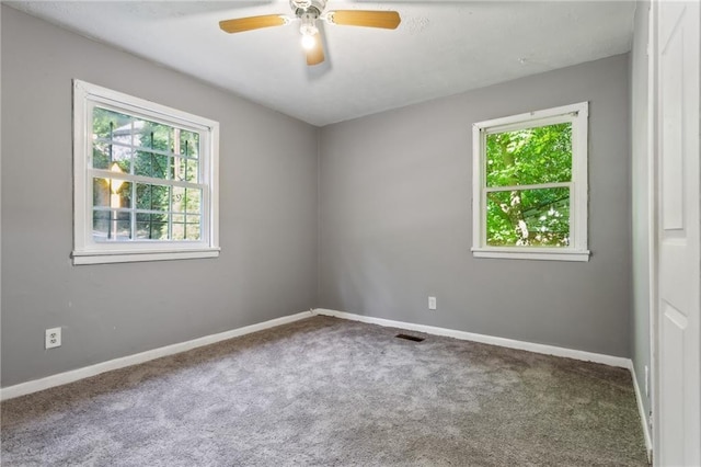 unfurnished bedroom with light colored carpet and a closet