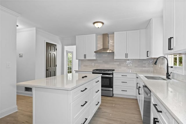 4166 Riverhill Ct NE, Roswell, GA 30075 - kitchen featuring wall chimney range hood, stainless steel appliances, a sink, backsplash, and crown molding