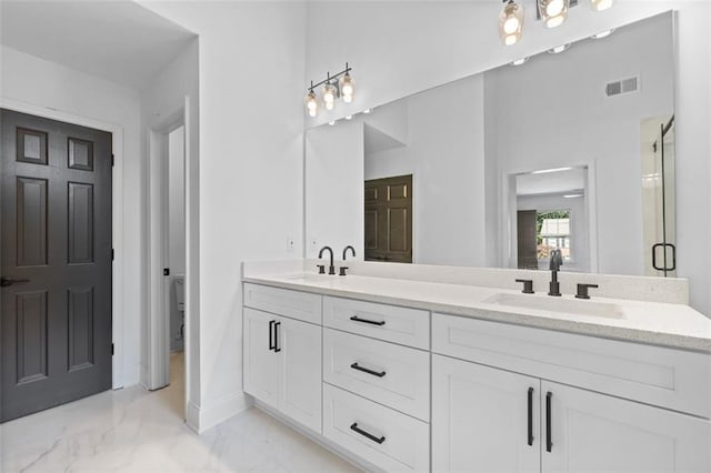 4166 Riverhill Ct NE, Roswell, GA 30075 - full bathroom with marble finish floors, double vanity, baseboards, and toilet