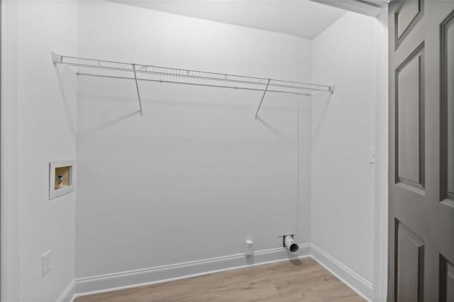 4166 Riverhill Ct NE, Roswell, GA 30075 - laundry room with washer hookup, light wood-style floors, and baseboards
