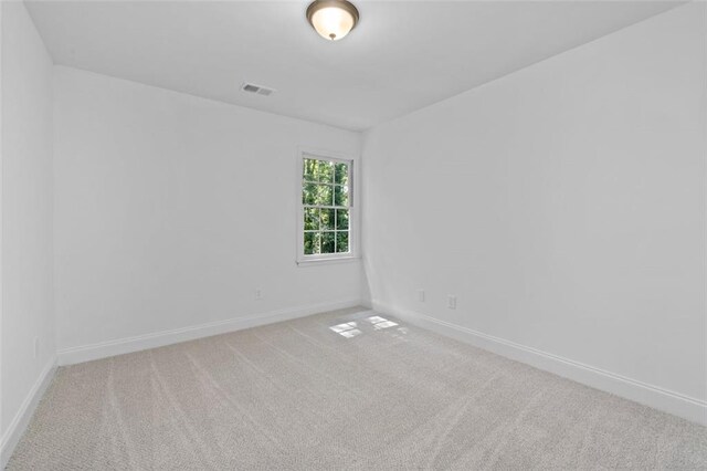 4166 Riverhill Ct NE, Roswell, GA 30075 - empty room featuring carpet and baseboards