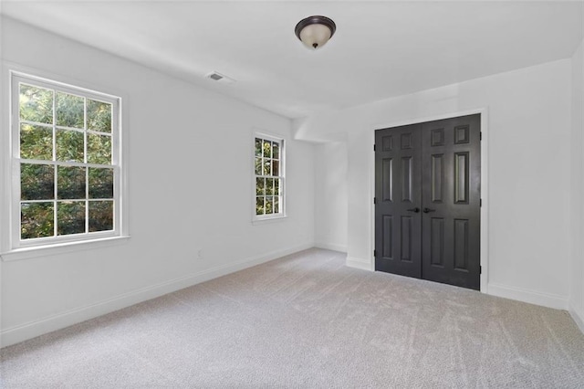 4166 Riverhill Ct NE, Roswell, GA 30075 - unfurnished room featuring carpet, plenty of natural light, and baseboards