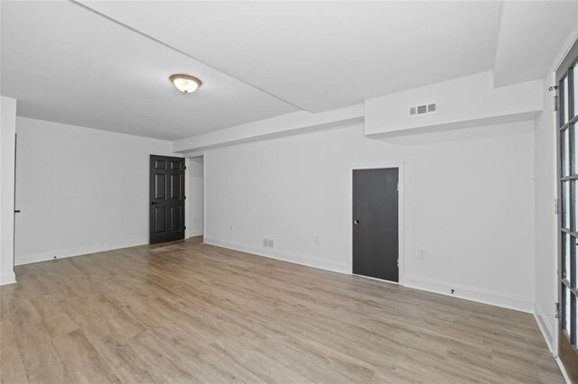 4166 Riverhill Ct NE, Roswell, GA 30075 - spare room featuring wood finished floors and baseboards