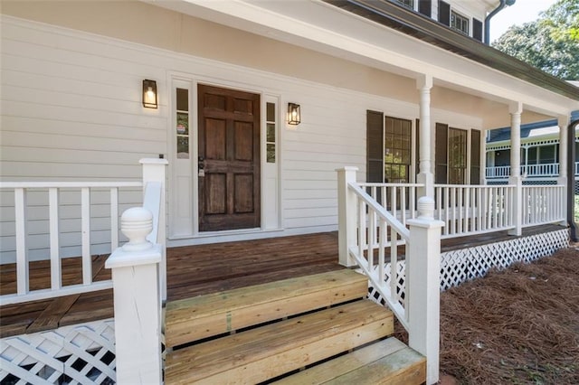 4166 Riverhill Ct NE, Roswell, GA 30075 - doorway to property featuring covered porch