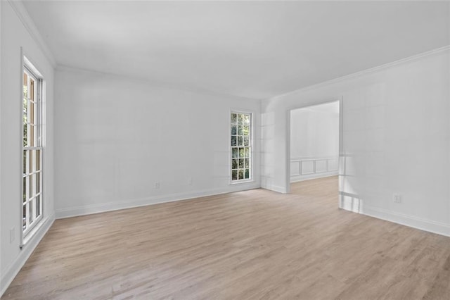 4166 Riverhill Ct NE, Roswell, GA 30075 - spare room with crown molding, plenty of natural light, light wood finished floors, and baseboards