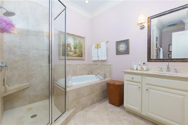 351 NE Washington Ave NE Unit 307, Marietta, GA 30060 - full bathroom featuring ornamental molding, vanity, a garden tub, a shower stall, and tile patterned flooring