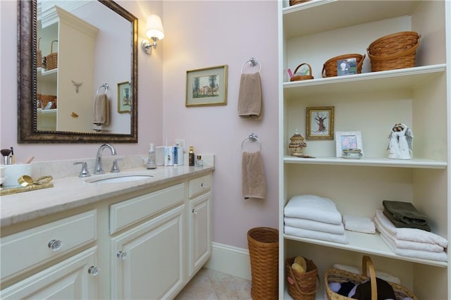 351 NE Washington Ave NE Unit 307, Marietta, GA 30060 - bathroom with vanity, tile patterned flooring, and baseboards