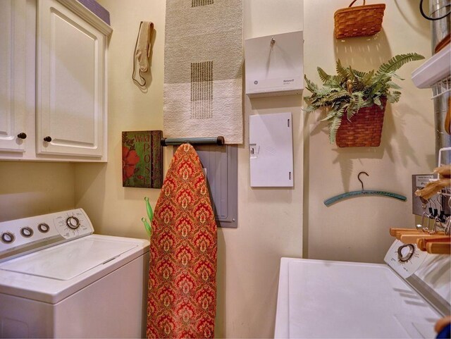 351 NE Washington Ave NE Unit 307, Marietta, GA 30060 - laundry area featuring cabinet space and independent washer and dryer