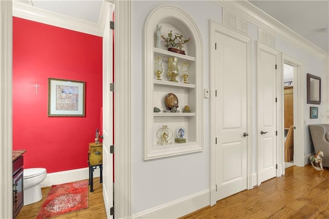 351 NE Washington Ave NE Unit 307, Marietta, GA 30060 - hall with wood finished floors, ornamental molding, baseboards, and built in features