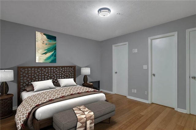 bedroom featuring light hardwood / wood-style floors