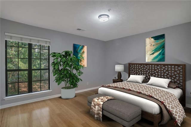 bedroom featuring hardwood / wood-style flooring