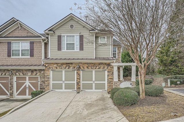 view of front of property with a garage