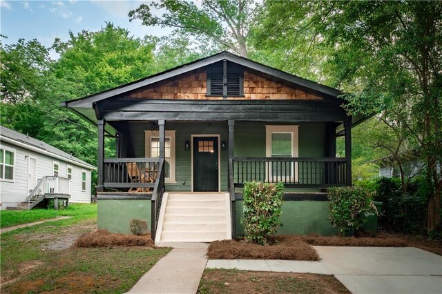 bungalow-style home featuring covered porch