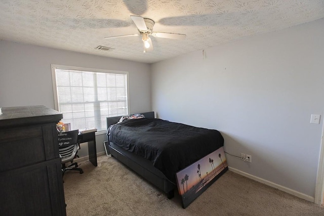 bedroom featuring visible vents, carpet floors, and baseboards